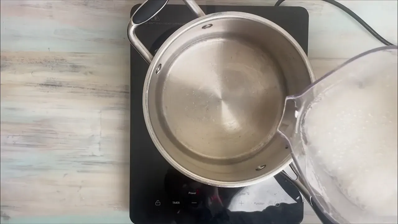 Pour the almond milk into a medium saucepan and heat gently over medium-low heat for 8 to 10 minutes, stirring frequently so it doesn't scorch on the bottom.