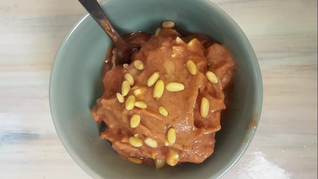 Scatter the chopped walnuts or toasted pine nuts over the top and enjoy immediately with a spoon.