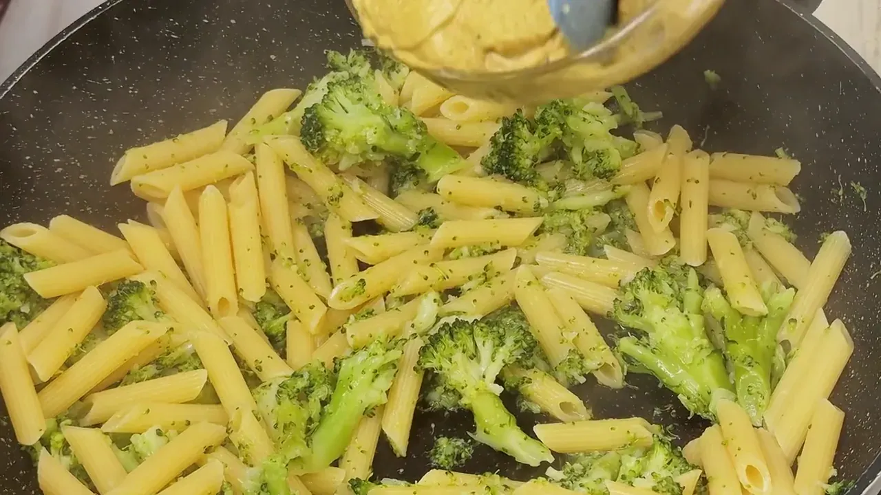 Drop the pasta into the boiling broccoli cooking water and cook until al dente. Reserve one cup of the starchy cooking water, then drain.