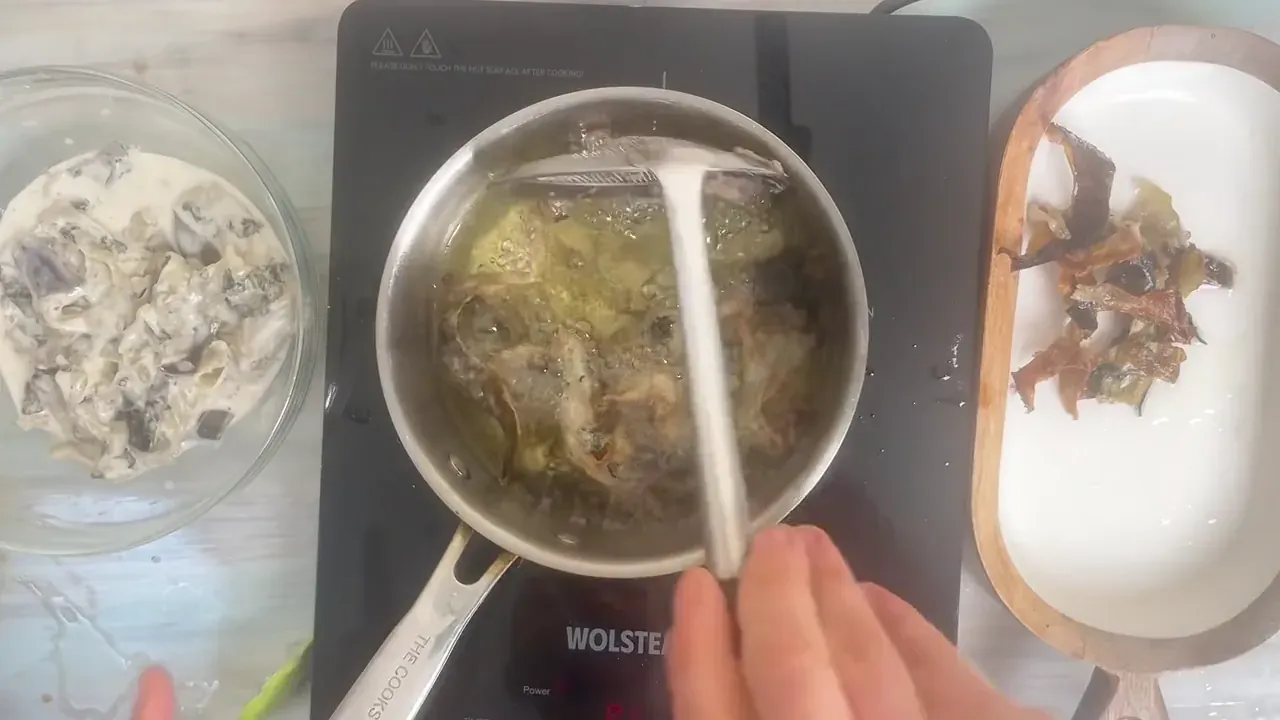 I heat 3 to 4 cm of oil to 175 C, dip each strip in the batter, and fry in batches until crisp and golden.