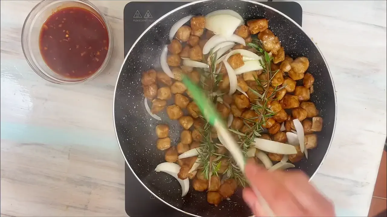 Add the remaining olive oil and sliced onions to the pan. Cook over medium heat for 10 to 12 minutes until softened and nicely caramelized.