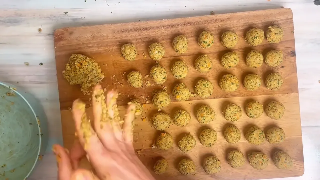 Roll the dough between your palms into roughly 20 to 24 uniform balls (about 3 cm / 1.2 inches in diameter).