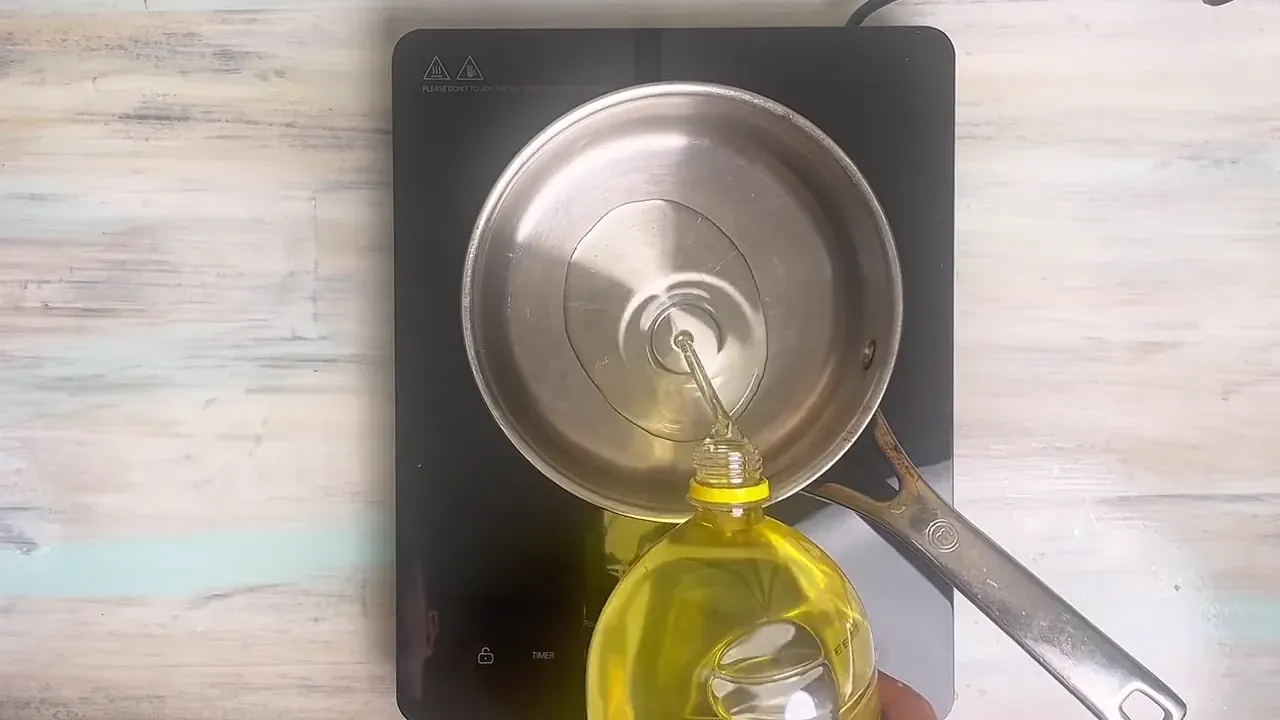 Heat vegetable oil in a deep saucepan or skillet to 175°C (350°F). Ensure there is enough oil for the balls to float freely.