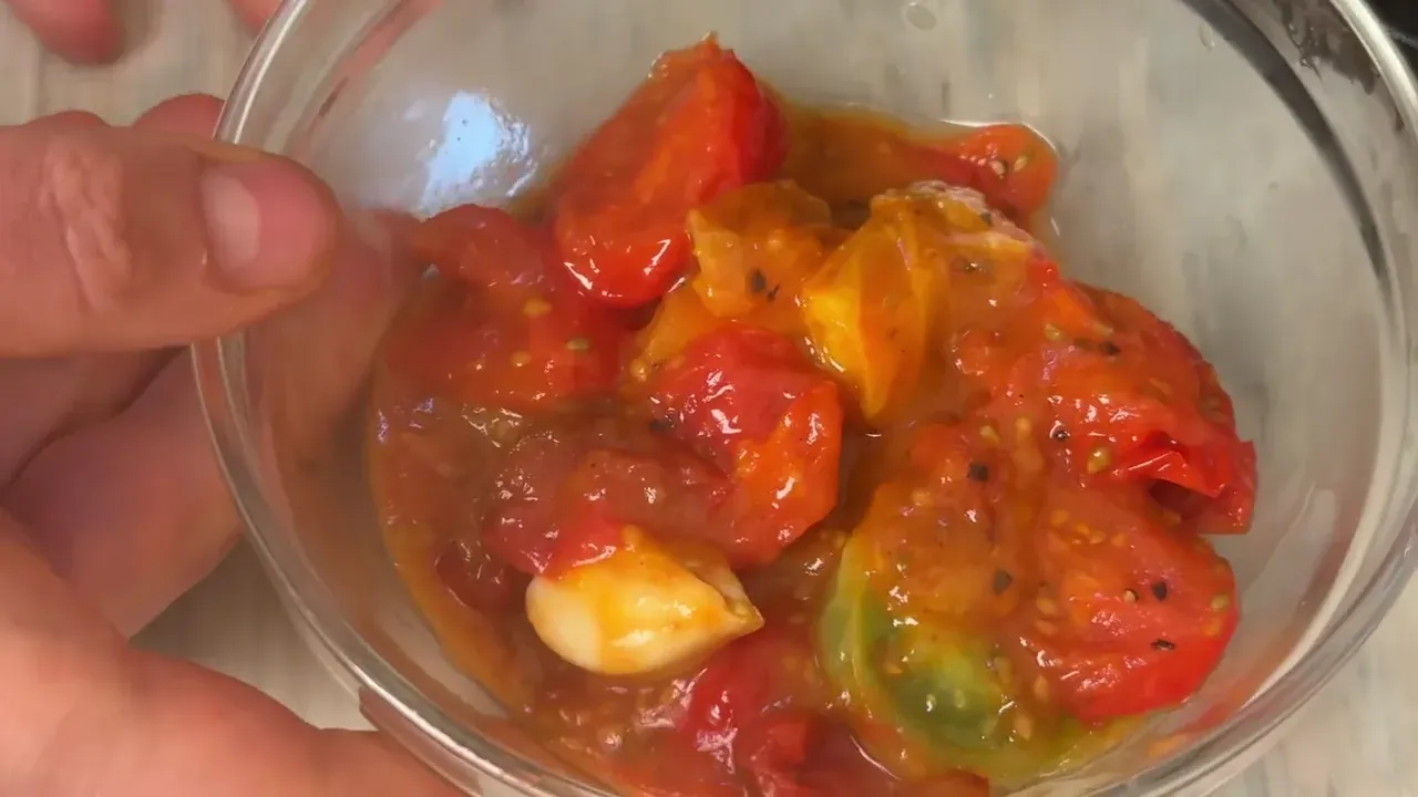 Scrape the tomatoes and all their warm pan juices into a bowl and set aside. Keep warm while you prepare the whipped cream.