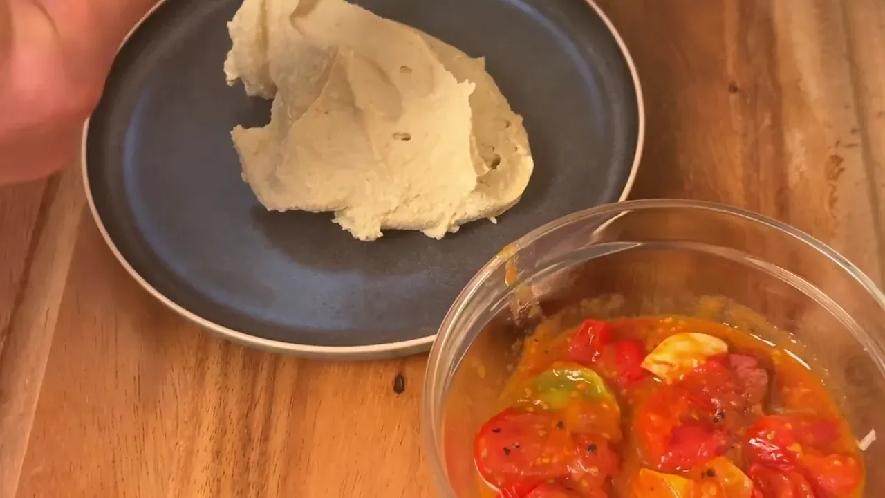Blend until roughly combined. Stop, scrape down the sides of the pitcher with a rubber spatula, then add the second drizzle of olive oil (1 tbsp) and blend on high until completely smooth, light, and whipped.